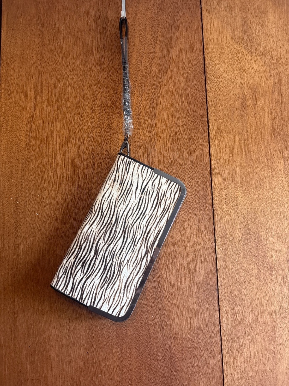 Ember Skye zebra print clutch